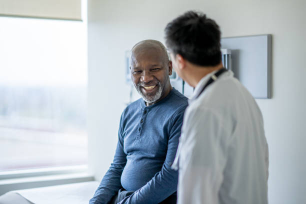 Doctor speaking warmly with a patient